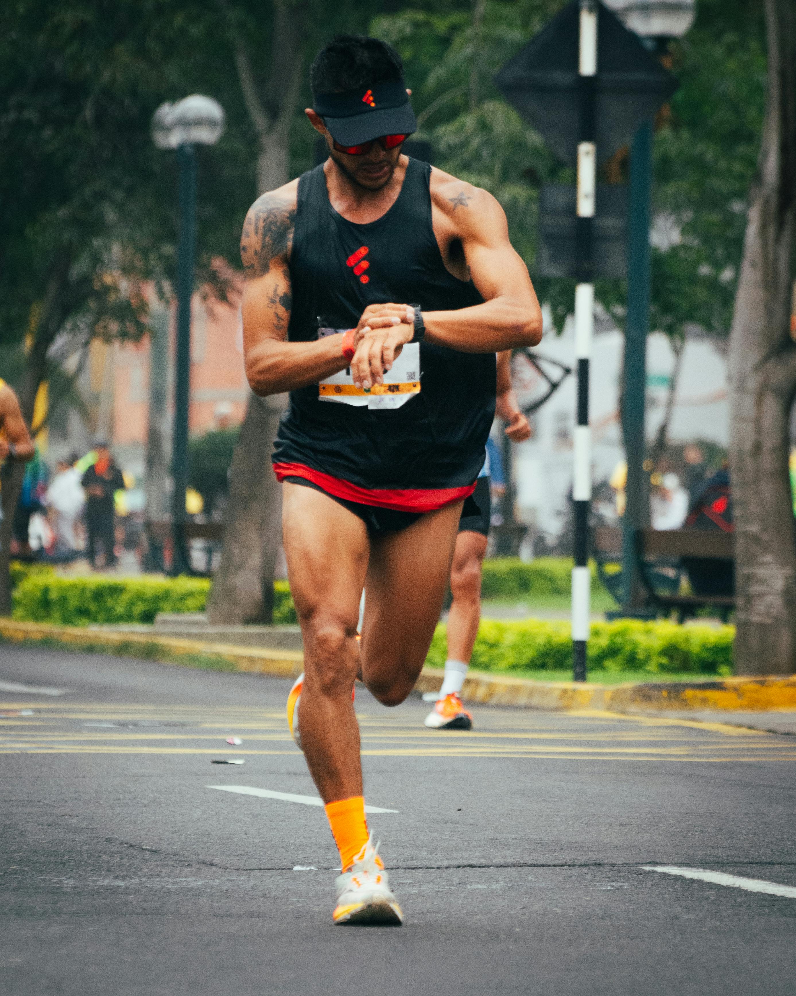 Runner checking watch during a race